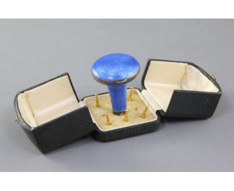 A cased George V continental silver and blue guilloche enamel combination parasol handle/compact, with six (ex 8) parasol tip