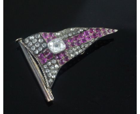 A late Victorian gold and silver, ruby and rose cut diamond set brooch modelled as a pennant, with central cushion cut diamon