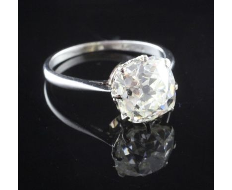 A 1940's/1950's platinum and solitaire diamond ring, the cushion cut stone with an estimated weight of approximately 3.50cts 