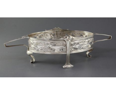 An Edwardian Art Nouveau pierced silver two handled oval dish by William Hutton & Sons, with stylised decoration and angular 