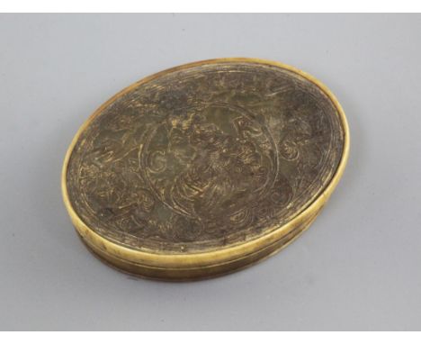 A George II horn snuff box, impressed with the Monarch's head and crest, with traces of old gilding, 3in.