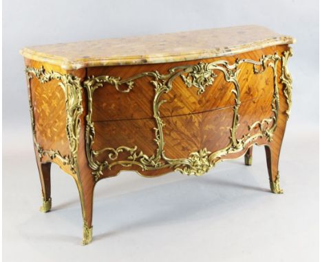 A Louis XV style ormolu mounted kingwood and marquetry bombe commode, with serpentine marble top and two drawers, W.4ft 8in. 