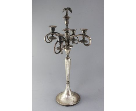 A late 19th/early 20th century Austro-Hungarian 800 standard silver four branch five light candelabrum, with twin scroll arms