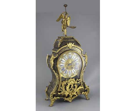 A 19th century French Louis XV style ormolu and boulle work mantel clock, surmounted with a figure of Victory, with tablet nu