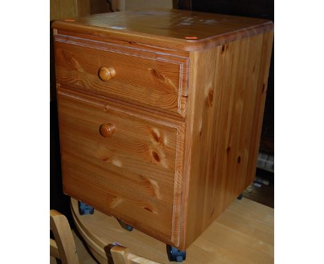 A modern pine round cornered two drawer office low filing chest on roller castors, width 44cm