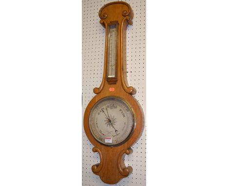 A mid Victorian oak two-dial wheel barometer, the silvered dial signed Negretti & Zambra, London, numbered 26095, height 83.5