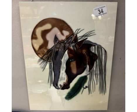 A large ceramic tile of a horse head 28 x 36cm