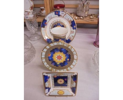 Four pieces of Royal Worcester porcelain to celebrate the Millenium 2000.