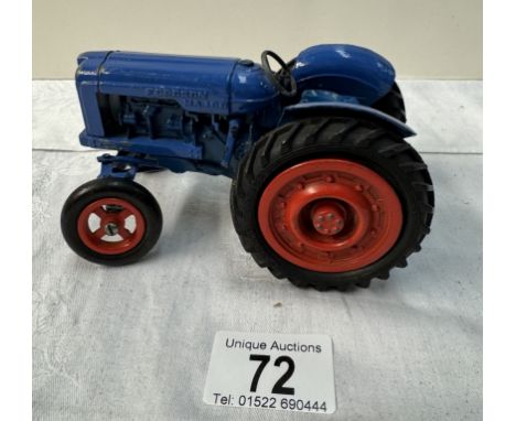 A large vintage Empire made Fordson Major diecast tractor. Length 14cm (Steeing arm A/F)