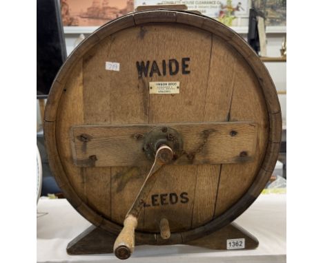 A 19th / 20th century large oak butter churn by Johnson Bros Spalding for Wade Leeds