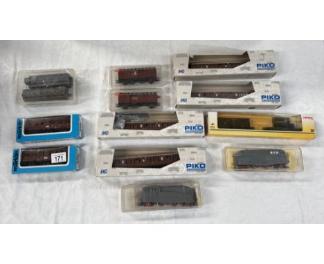 A quantity of HO gauge engines &amp; goods wagons including Lima, Marklin, Piko etc