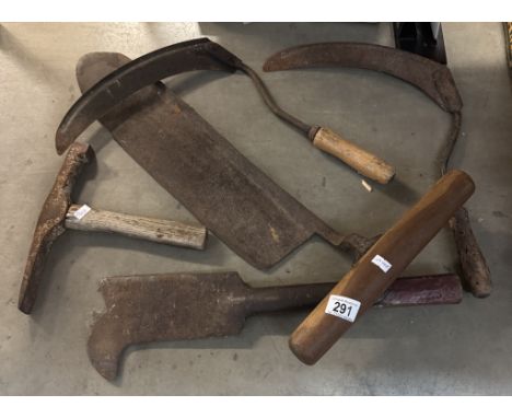 A selection of vintage farming hand tools including hedge laying bill hook &amp; hay knife etc.