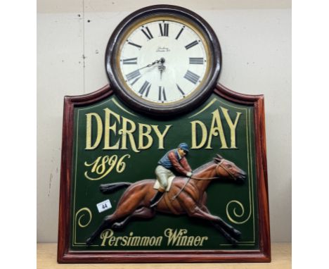A large painted wooden retro Derby day persimmon winner horse racing quartz wall clock. 60 x 78cm