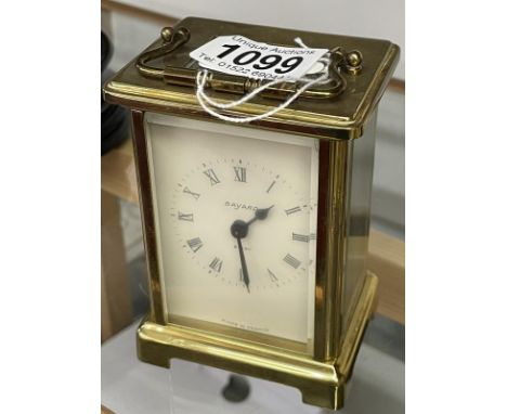 A Bayard brass carriage clock engraved on front 'Volvo Penta UK'.