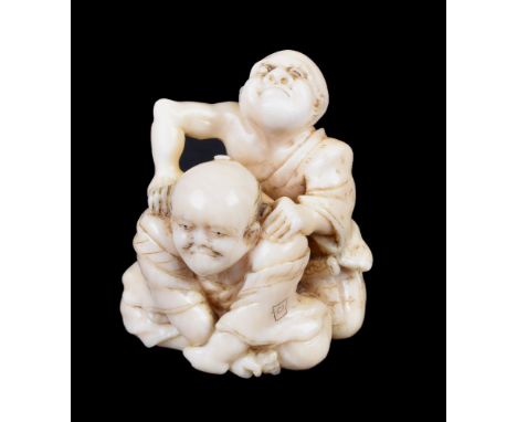 ϒ MASAYOSHI: An Ivory Japanese Netsuke of a blind masseur kneeling behind his seemingly rather disgruntled client who grips h