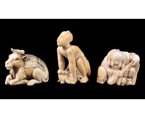 ϒ A Japanese Ivory Netsuke of Hotei, the corpulent figure kneels with an uchiwa stuck through his belt, he opens the mouth of