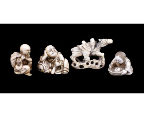 ϒAn Ivory Netsuke of sage on horseback, 18th century, 5.2cm long x 4cm high; three Netsuke, including one of a boy watching a