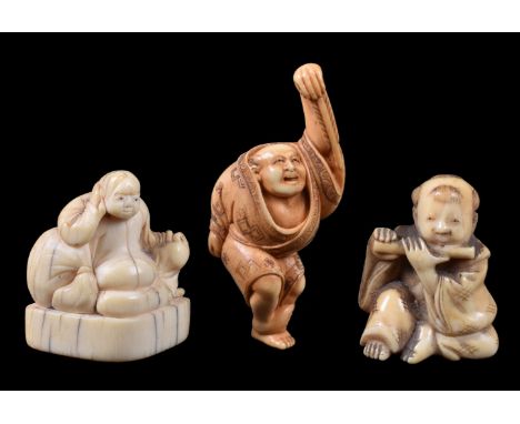 ϒ A Japanese Ivory Netsuke of a so-called Crane Dancer, the man balances on one foot and holds his fan aloft to form the head