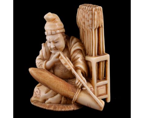 ϒSadamasa: A Japanese Ivory Okimono of a Seated Archer, he sits on a straw mat before a rack of arrows, a quiver lies across 