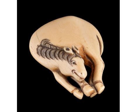 ϒ A Japanese Kyoto School Ivory Netsuke of a Grazing Horse, the animal stands in a typically rounded form with its hooves clo