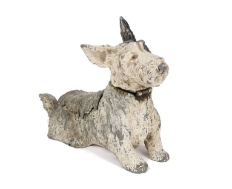 A cold painted novelty spelter table lighter and ashtray compendium, circa 1950, probably a West Highland terrier, 14cm high.