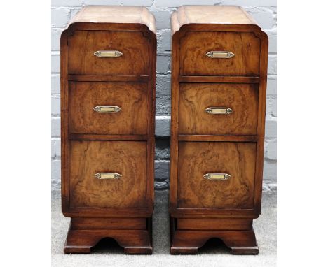 A pair of 1930s walnut three drawer bedside tables, on bracket feet, 27cm wide x 69cm high. 