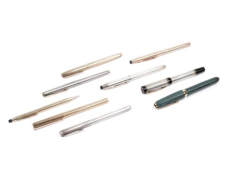 A Dunhill ballpoint pen with silvered engine turned decoration and eight further pens, (9) 6709