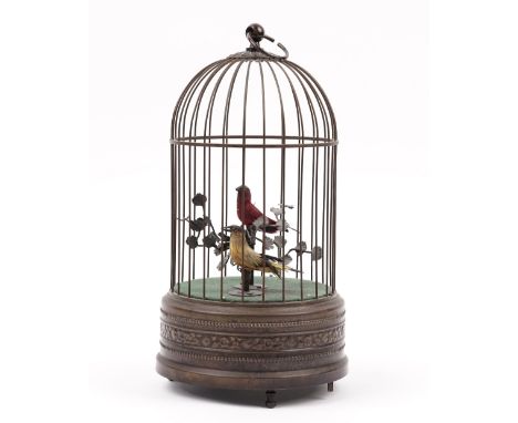 A reproduction automaton bird cage with musical movement, 26cm. 