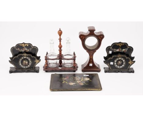 A pair of Victorian papier mache letter racks with mother-of-pearl inlay, 20cm high, a Victorian papier mache blotter cover, 