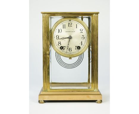 A brass cased four glass mantel clock, early 20th century, the silvered dial detailed 'HENRY BIRKS &amp; SONS LTD' with an Am