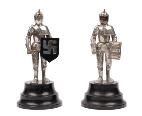 A pair of white figural table lighters, mid to late 20th century, each modelled as a knight in suit and armour, comprising a 