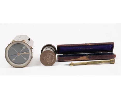 A gilt brass surveyors Equerre (18cm), a WW2 cockpit lamp Mk2, and a brass cased compass by Highes and Son Ltd. (3). 