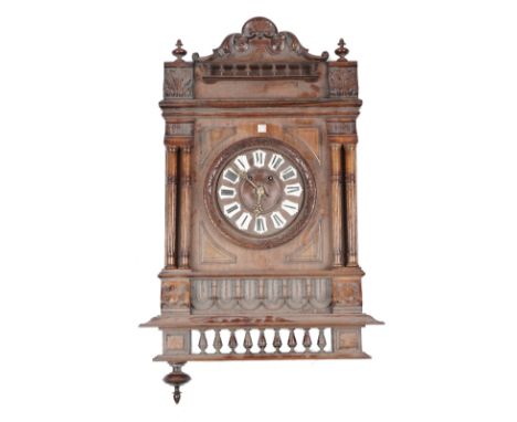 A Black Forest style cuckoo clock of typical form (57cm high) (Pendulum) and a French walnut wall clock of architectural form