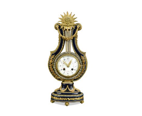 A French blue porcelain and gilt metal mounted lyre mantel clock, late 19th century,  with sunburst crest above painted dial 