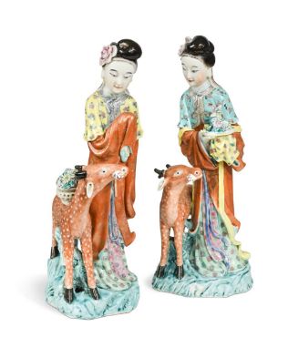 Two similar Chinese enamelled porcelain figures of the Immortal Magu with deer, late Qing Dynasty, each tall mythical maiden 