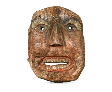 A group of four tribal masks and figures,  to include a late 19th or early 20th century Nepalese carved and painted wood mask