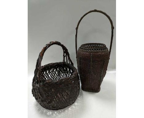 Two Japanese Ikebana baskets, both signed, 19th/20th century, 49cm and 33cm high respectively; a Japanese red lacquer and elm