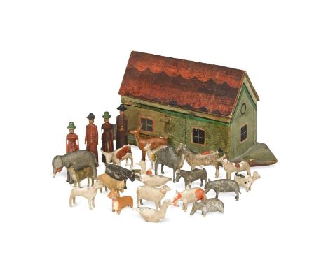 A Noah's ark model, 19th century, the carved and painted ark containing four primitively carved figures and twenty-one carved