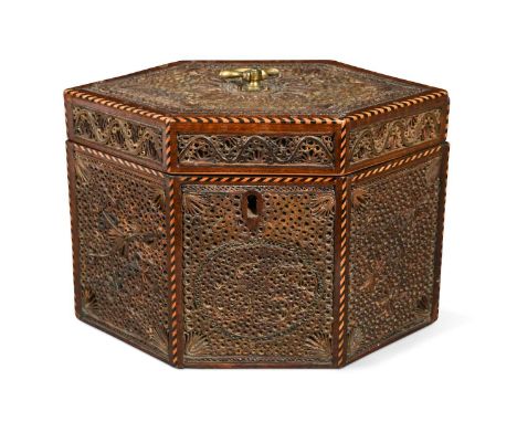 A George III quillwork tea caddy, of hexagonal form, each 'rolled paper' panel divided by chequered string inlay11.5 x 17 x 1