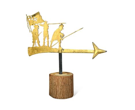 A gilt metal weather vane depicting the three musketeers, mounted to a log base92 x 97cm