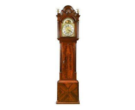 A mahogany longcase clock, early 19th century,   the restored arched moulded top hood with blind fret frieze above 32.5cm bra