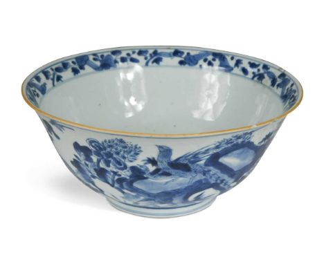 A Chinese blue and white porcelain bowl, Qing Dynasty, Kangxi Emperor, circa 1720, painted with birds, rocks and flowers10 x 