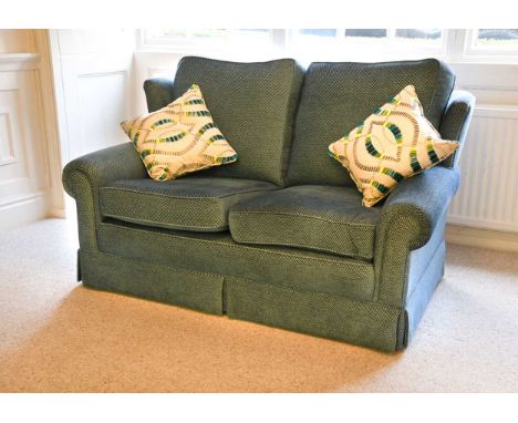 A modern compact two seater sofa, in blue upholstery150cm wide