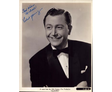 Robert Young signed 10x8 inch vintage "Claudia" black and white movie still photo. Good condition Est.