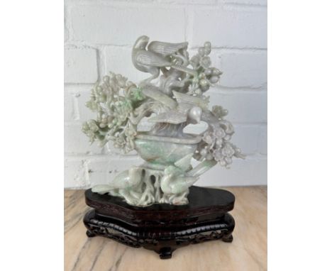 A CHINESE JADE GROUP OF BIRDS ON BRANCHES ON ROSEWOOD STAND,Probably 20th century or modern.The jade 24cm x 22cm 