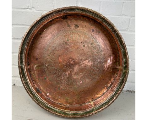 A LARGE PERSIAN COPPER BASIN OR BOWL WITH SAFAVID TYPE ENGRAVINGS, 47Ccm x 9cm 