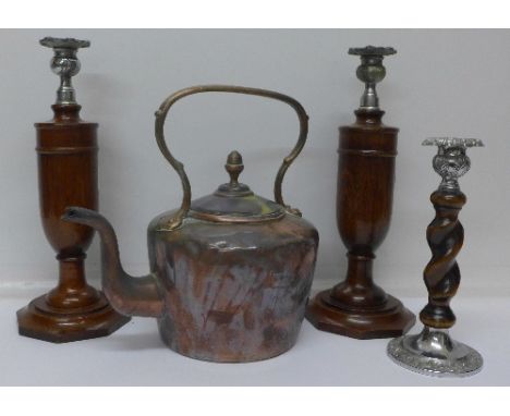 A pair of wooden candlesticks, a barleytwist candlestick and a copper kettle