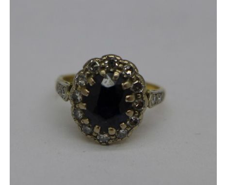 An 18ct gold, diamond and sapphire ring, 3.8g, K