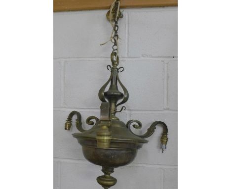 An Art Nouveau brass light fitting
