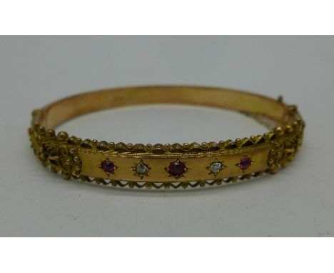 An Edward VII 9ct gold bangle, Chester 1906, 7.8g, with one dent